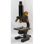 A small Spencer Lens Co. of Buffalo New York microscope, numbered 41598, retailed by H F Angus & Co.