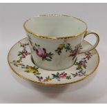 An 18th century Derby porcelain trembleuse cup and saucer,