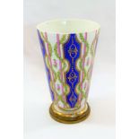 An 18th century Sevres porcelain vase, of tapering cylindrical form with gilt metal mounted foot,