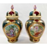 A pair porcelain lidded vases, with transfer decorated figural scenes and green,