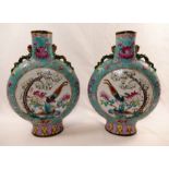 A pair of Chinese famille rose porcelain moon flasks, with Tongzhi mark,