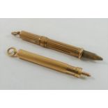 A 9 carat gold pencil holder with propelling action, marks rubbed, 6.