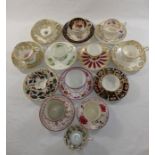 A collection of Regency and later tea and coffee cups and saucers including an early 19th century
