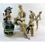 Four Lladro porcelain figures, comprised of a ballerina on a chair, 24cm high,