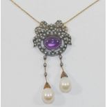 An early 20th century style pendant necklace set with diamonds, seed pearls,