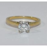 A diamond single stone ring, the round b