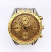 Omega, Speedmaster a gents automatic steel and gold chronograph wristwatch.