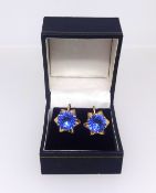A pair of mid 20th Century vivid blue stone earrings with insurance schedule indicating faceted