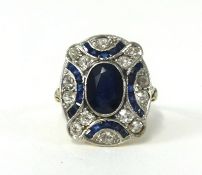 A styliish diamond and sapphire ring, setting size 17mm x 19mm, size L/W.