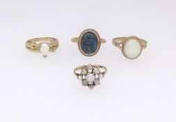Four 9ct gold opal set various dress rings, approx 14.5gms.