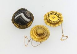 A 19th century gold mourning brooch, tow others brooches agate set and pinchbeck (3).