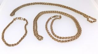 Two 9ct gold necklaces and a 9ct gold bracelet (3), total weight approx 78.70gms.