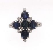 A 9ct white gold sapphire and diamond cross ring, size S.