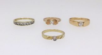 Four 18ct gold and diamond set dress rings including a nine stone channel set and half band eternity