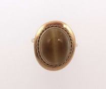 A 9ct tigers eye ring, size J.