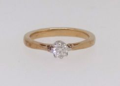 An 18ct single stone diamond ring, size N.