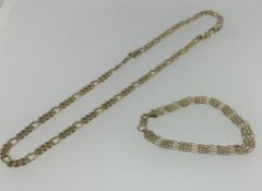 A 9ct gold necklace and a 9ct bracelet, approx 28.5gms.