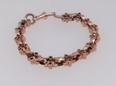 A 9ct rose gold bracelet, approx 24.8gms.