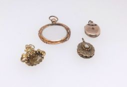 A magnifying glass in yellow metal mount, an antique gilt locket set with opal, a gilt and ornate