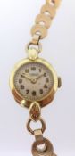 Benson, a ladies 9ct gold wristwatch (with later yellow metal bracelet).