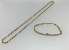 A 14ct gold necklace and a 14ct bracelet, approx 21gms.