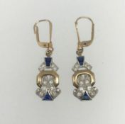 A pair of sapphire and diamond drop earrings set in 9ct yellow gold.