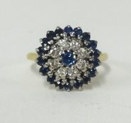 A yellow gold sapphire and diamond ring (hallmarked rubbed), size L.