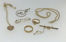An 18ct wedding band (approx 6.8gms), two 9ct necklaces and a brooch (approx 17gms) and a unmarked