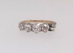 An 18ct five stone ring set with old cut diamonds, size K.