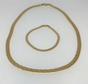 An Italian 14k gold Milanese style necklace and matching bracelet, approx 19gms.