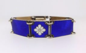 A silver and enamelled bracelet.