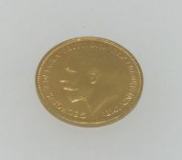 A rare Geo V 1911 gold Two Pound Coin.