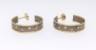 A pair of 18ct hoop gold and diamond set earrings, approx 8.8gms.