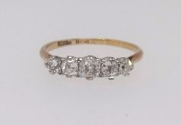 An 18ct five stone ring set with old cut diamonds, size O.