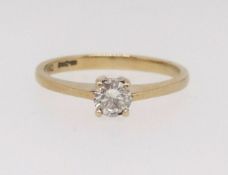 An 18ct diamond solitaire ring, size P, approx 3gms.