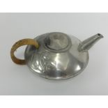 Liberty Tudric pewter teapot, pattern number 0231? with cane handle.
