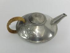 Liberty Tudric pewter teapot, pattern number 0231? with cane handle.