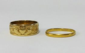 A 9ct wedding band (2.5gms) and a 22ct wedding band (4.7gms).