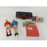 Two vintage Action Man football figures and stands together with a small collection of Tri-ang