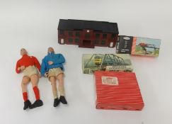 Two vintage Action Man football figures and stands together with a small collection of Tri-ang