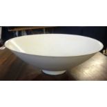 A Chinese celadon shallow bowl, diameter 21cm.