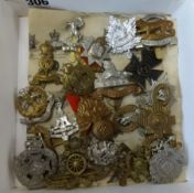 A collection of various military badges.