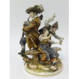 A large porcelain group of a bagpipe player and two companions, height 28cm.