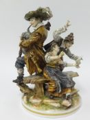 A large porcelain group of a bagpipe player and two companions, height 28cm.