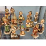 A collection of Goebel Hummel figures including large group 'Knitting Lesson' approx 19cm with