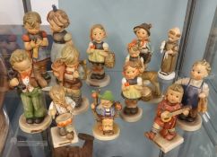 A collection of Goebel Hummel figures including large group 'Knitting Lesson' approx 19cm with