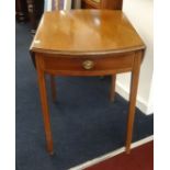 A mahogany pembroke table with inlaid decoration.