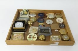 A collection of various compacts (24).