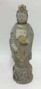 An Asian carved wood standing Buddha, height 59cm.