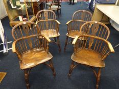 Four late 19th/early 20th century Windsor elm and beech farmhouse chairs.